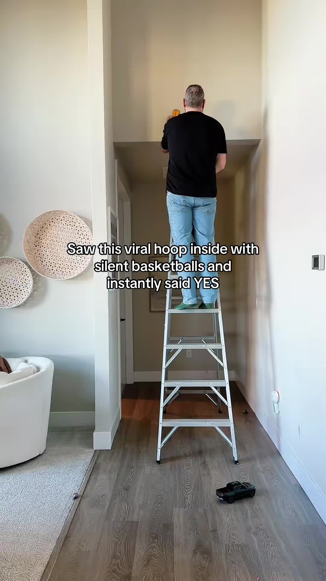 installing indoor basketball hoop in living room hallway nook