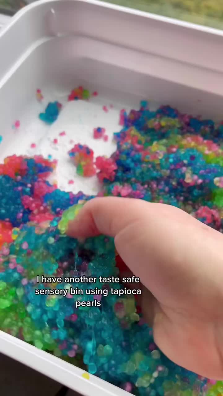 colorful tapioca pearl sensory bin for toddlers taste safe slimy play