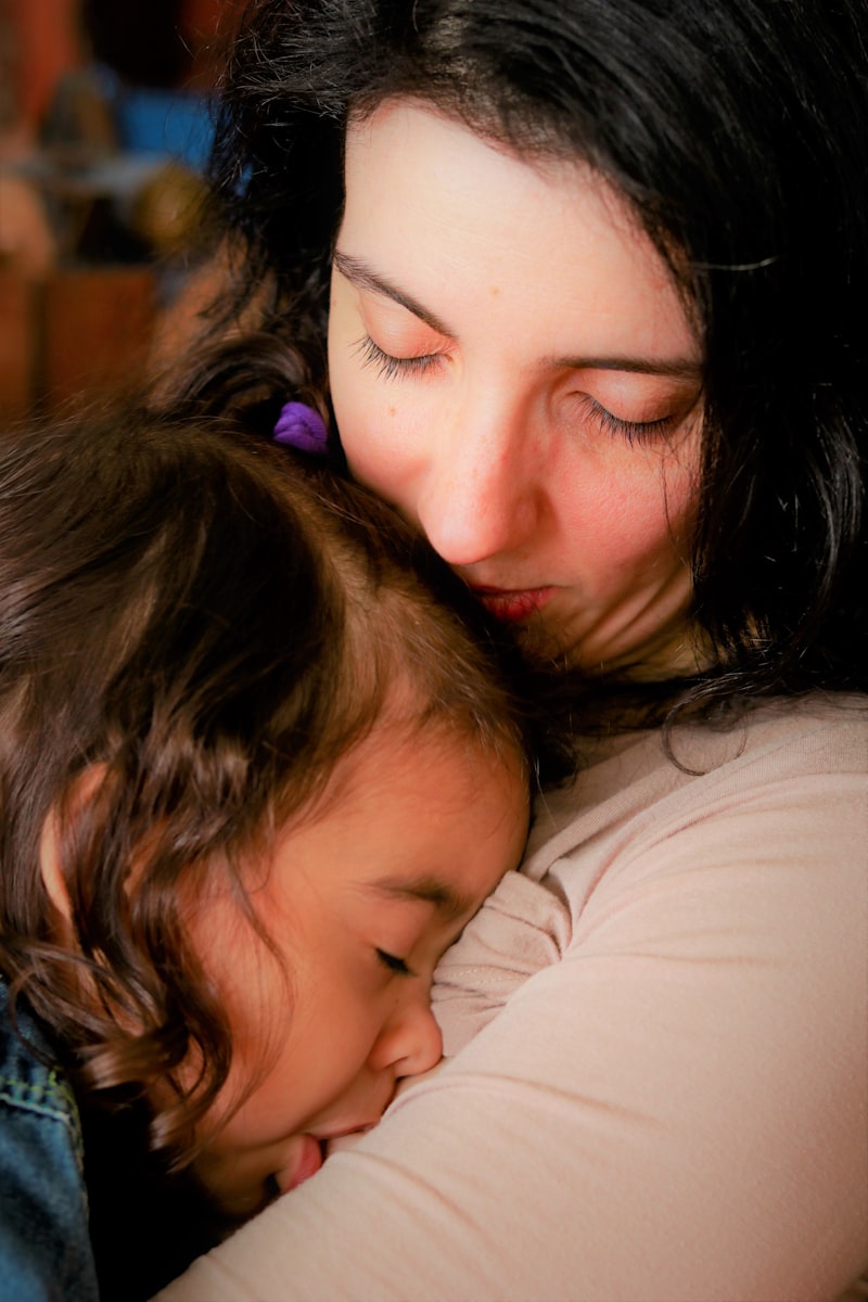 Tired mom sitting quietly, ADHD parenting exhaustion